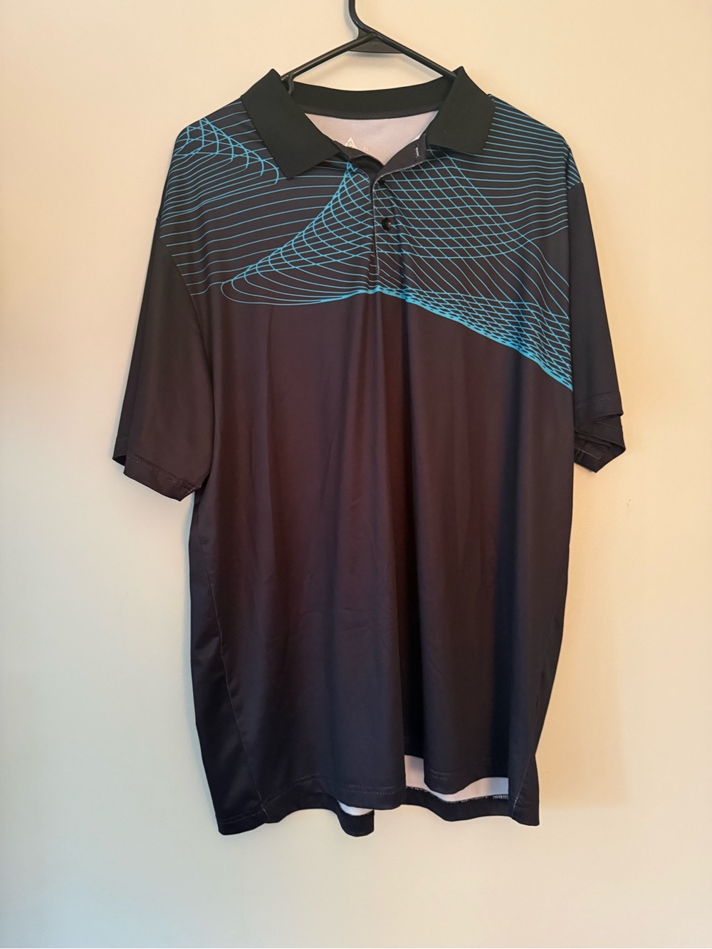 Mountain Hardwear Black Polo with Teal Wave Graphic